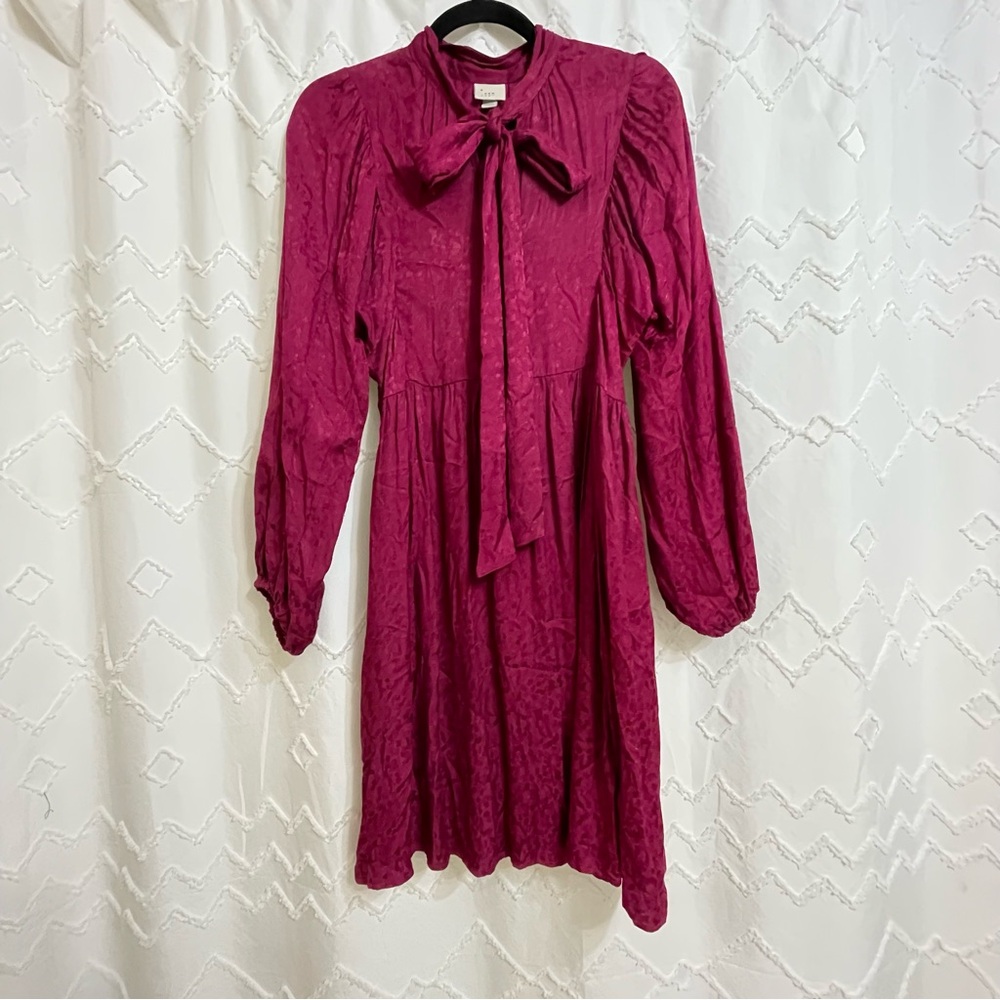 Fun Pink Swing Dress with Bow Accent